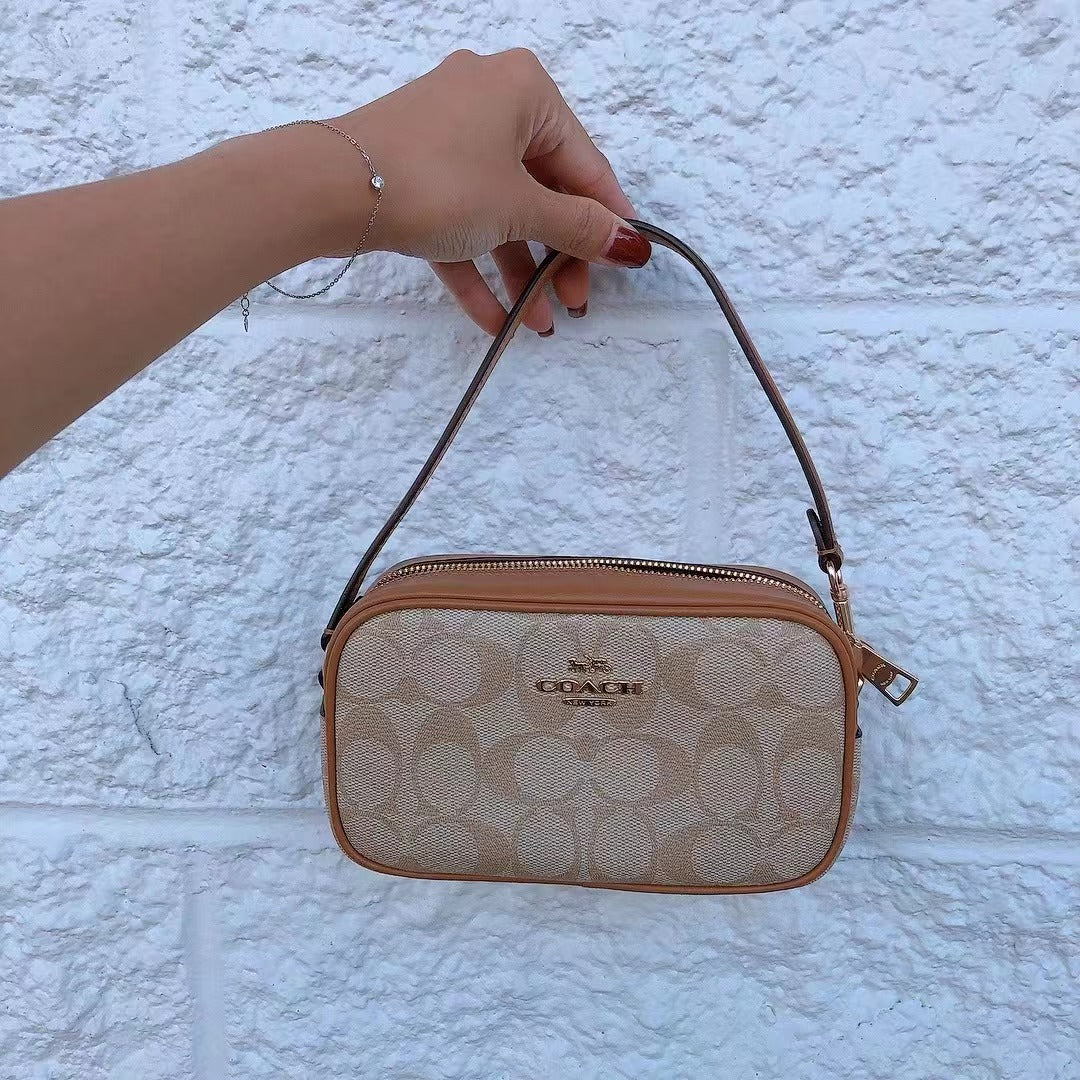 Coach CA718 Jamie Wristlet In Signature Canvas In Gold/Lt Khaki/Lt Saddle Coach CA718 Jamie Wristlet In Signature Canvas In Gold/Lt Khaki/Lt Saddle